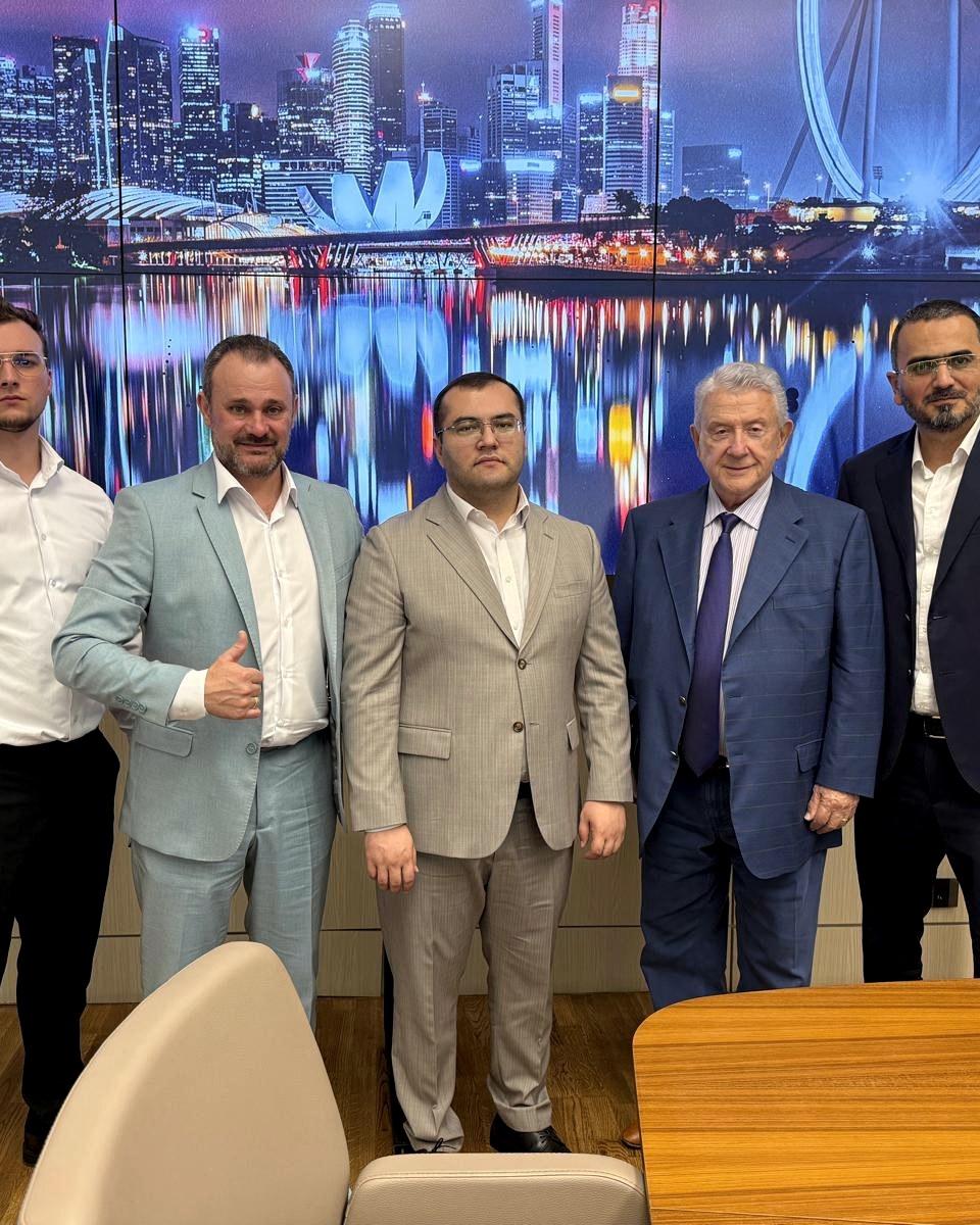 Grigoriy Kats with international partners at a power-generation project meeting